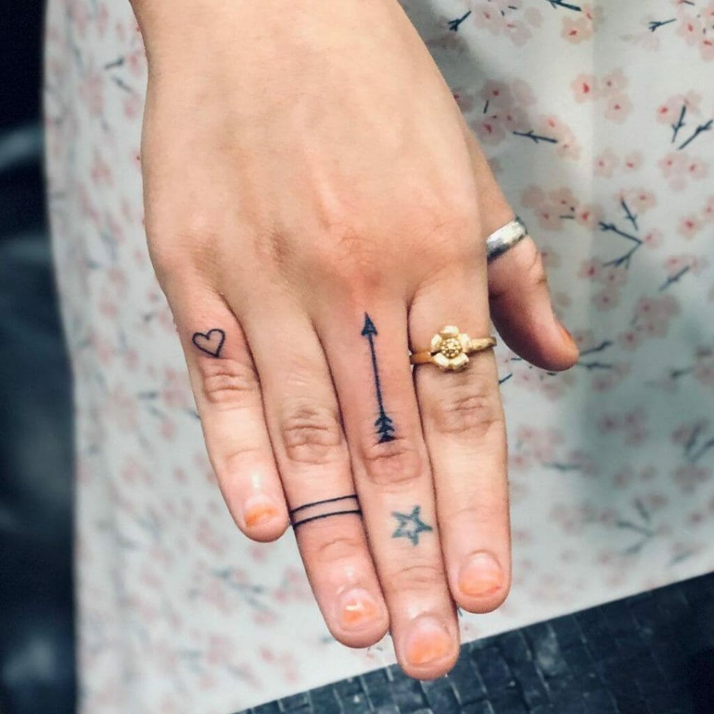 Arrow Middle Finger Tattoo