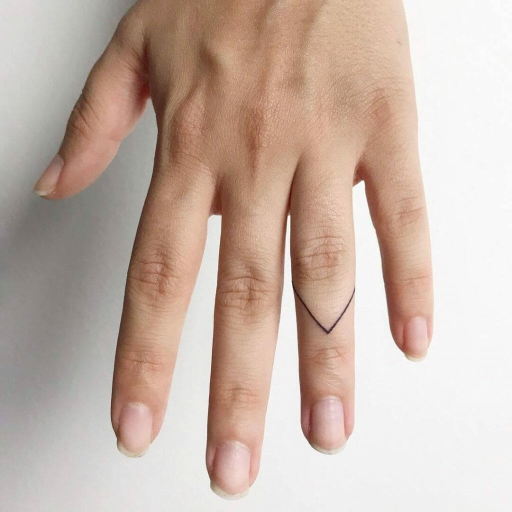 Arrow Ring Finger Tattoo