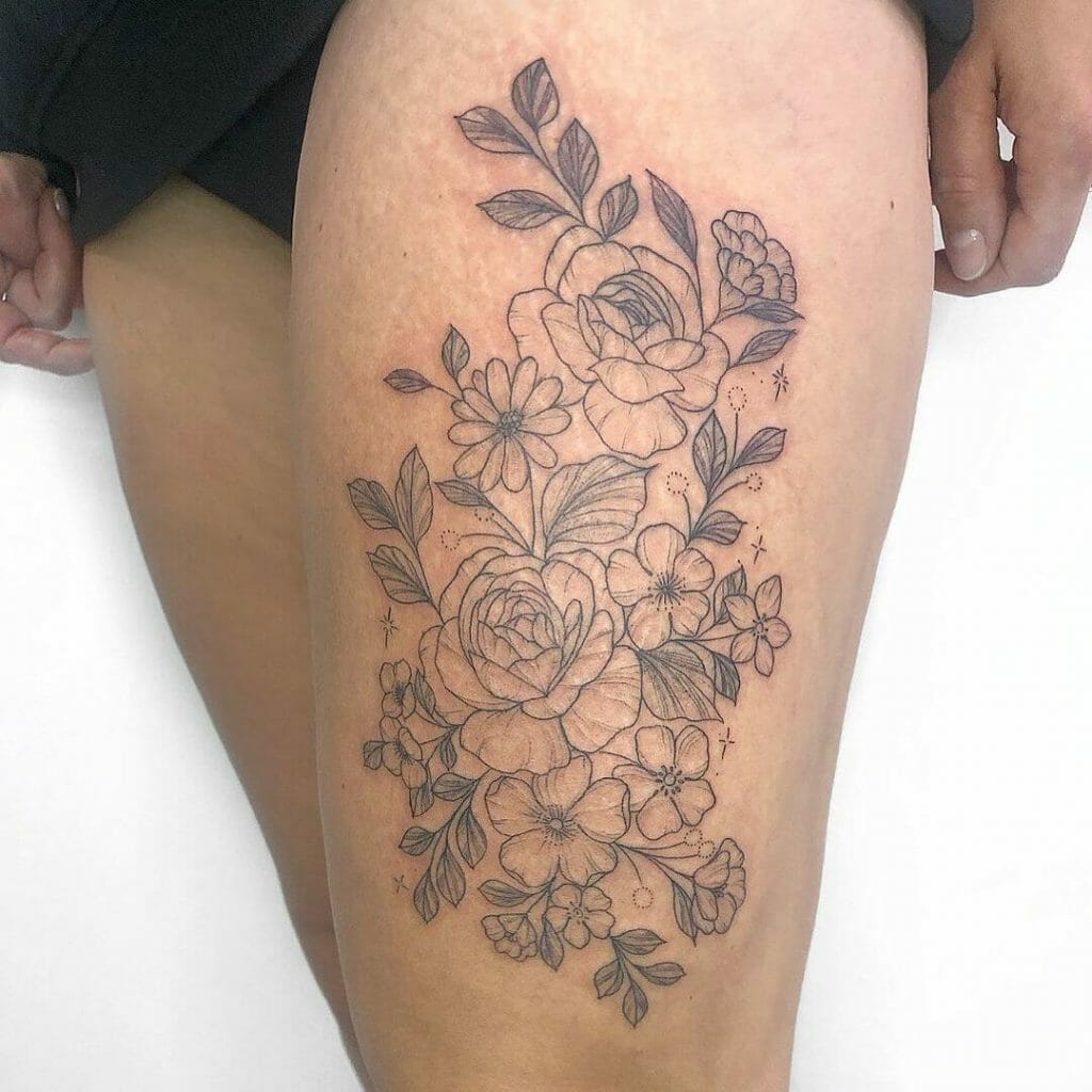Beautiful Flower Tattoo On The Thigh