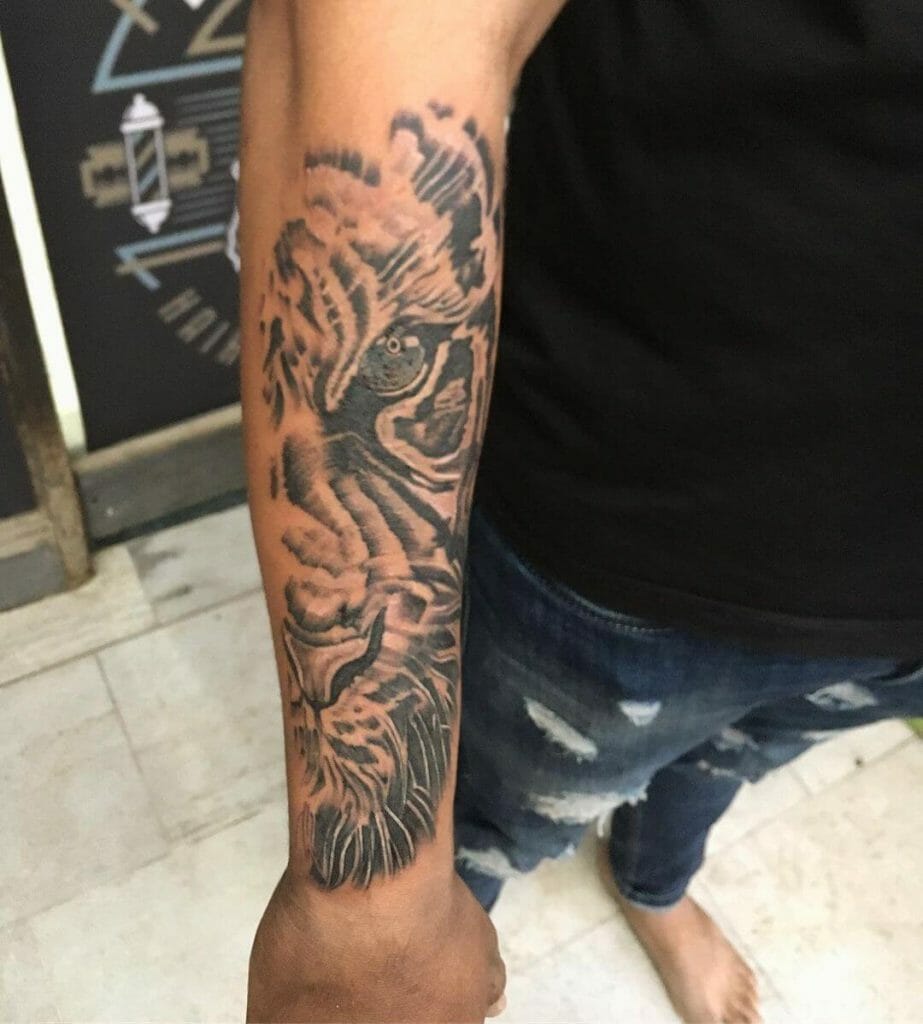 Black And Grey Half Tiger Face Tattoo
