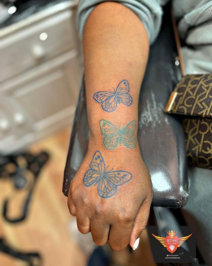 Blue and Green Butterfly Tattoo