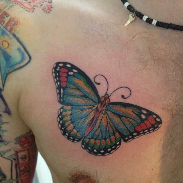 Butterfly Neck And Chest Tattoo