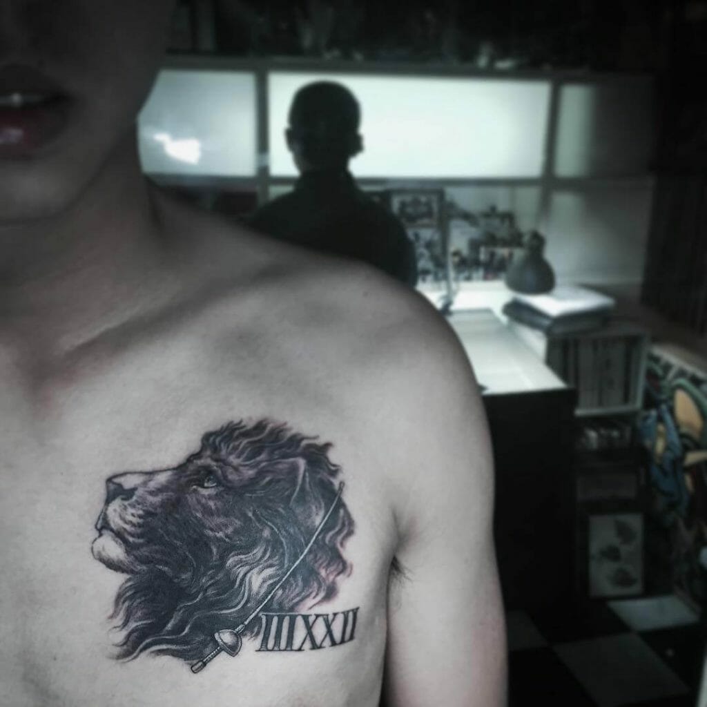 Chest Lion And Fencing Tattoo