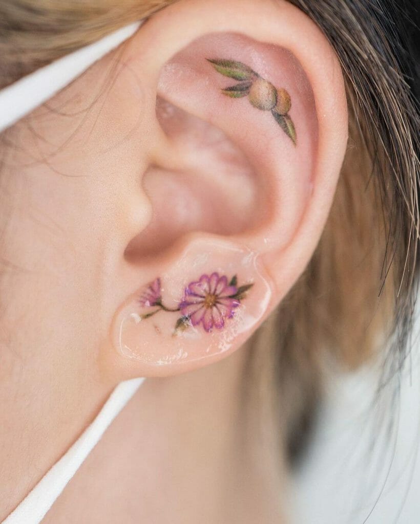 Colourful Floral Ear Lobe Tattoo Design