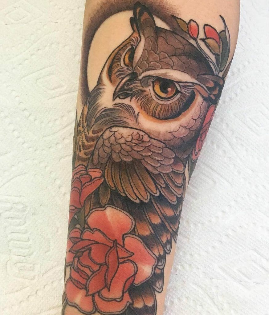 Colourful Horned Owl Tattoo In Shades Of Red