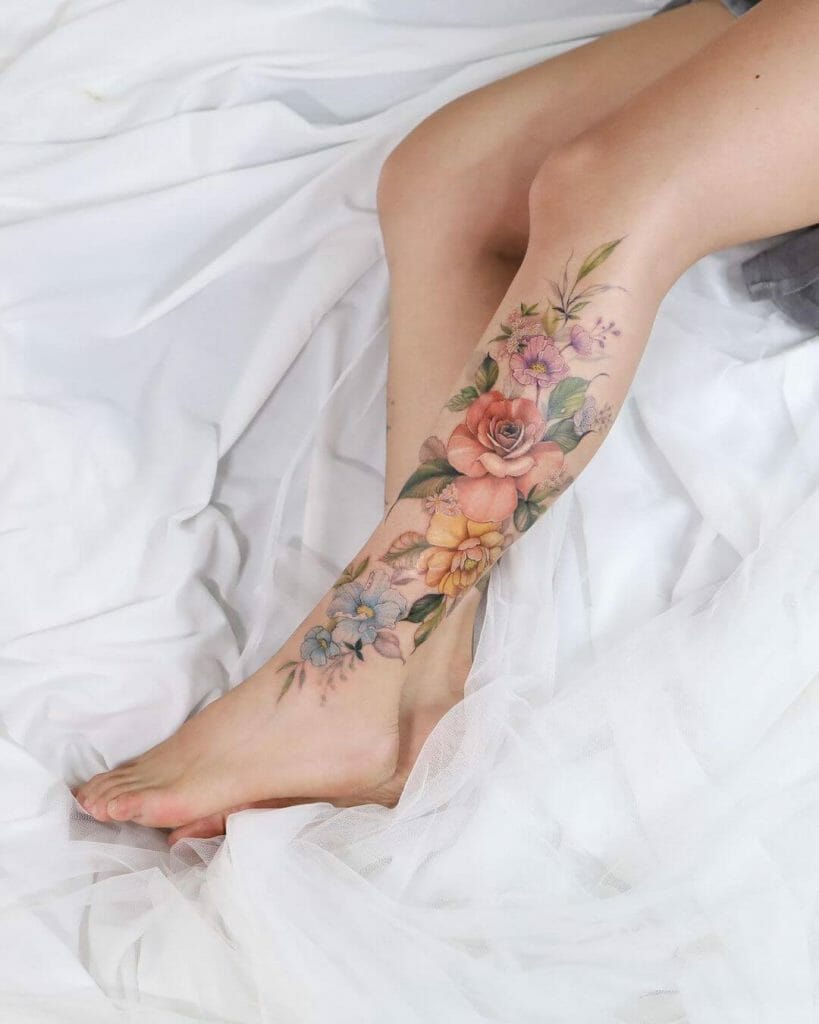 Colourful Multi-floral Tattoo For The Lower Half Of Your Leg