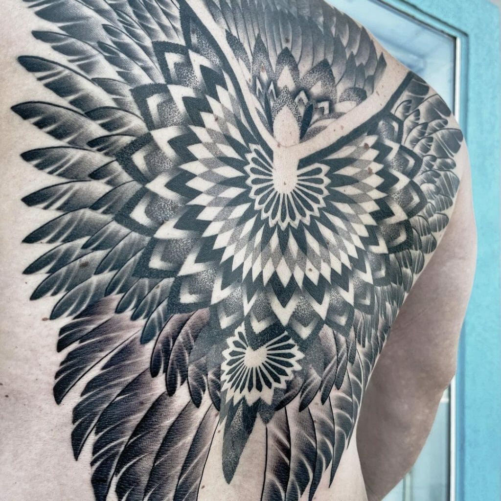 Complete Feather Work Tattoo For Upper Back