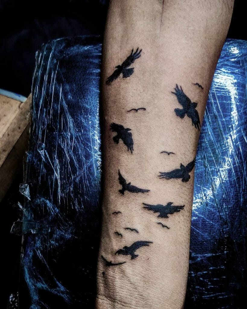 Flock Of Ravens Tattoo Design