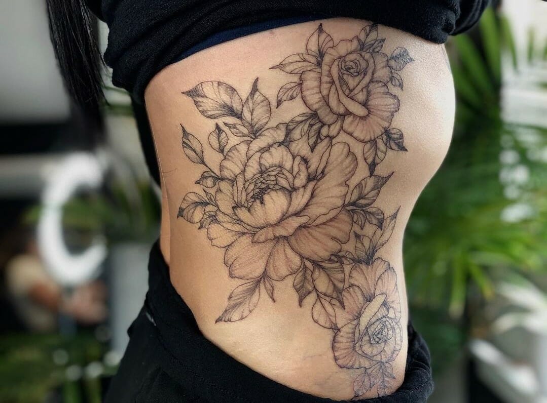 Birth flower tatto on side｜TikTok Search