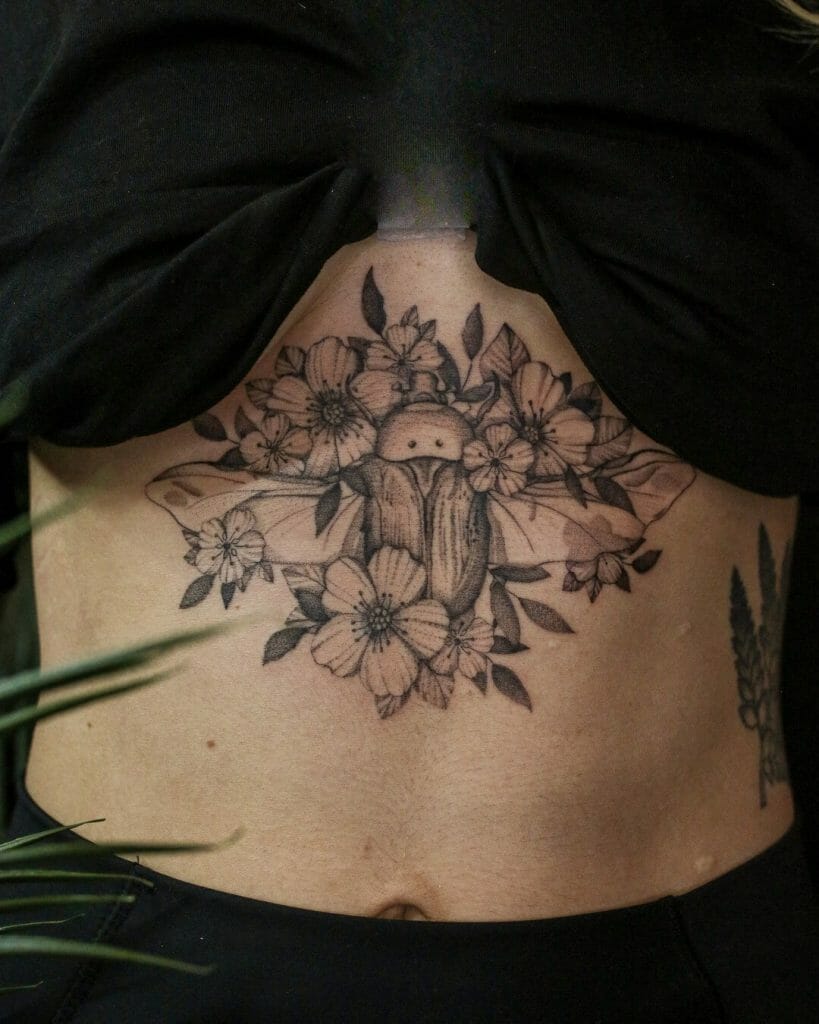 Flower And Beetle Sternum Tattoos
