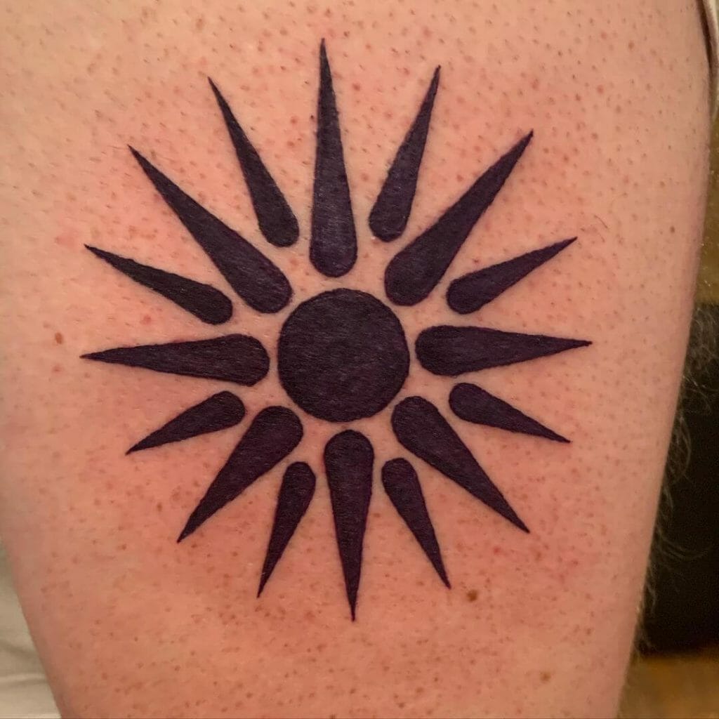 Geometric Tribal Sun Tattoo