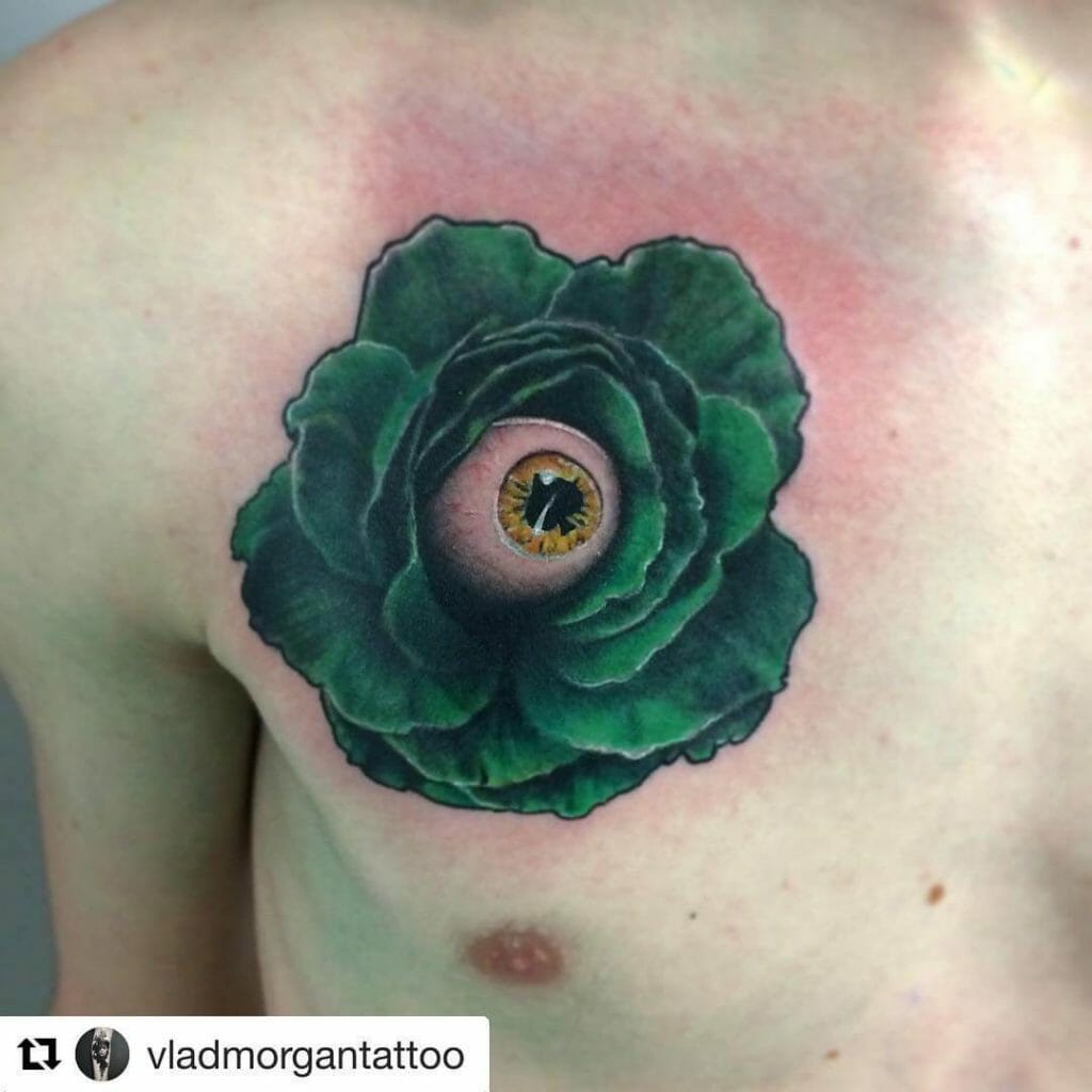 Green Rose Tattoo With An Eye Ball