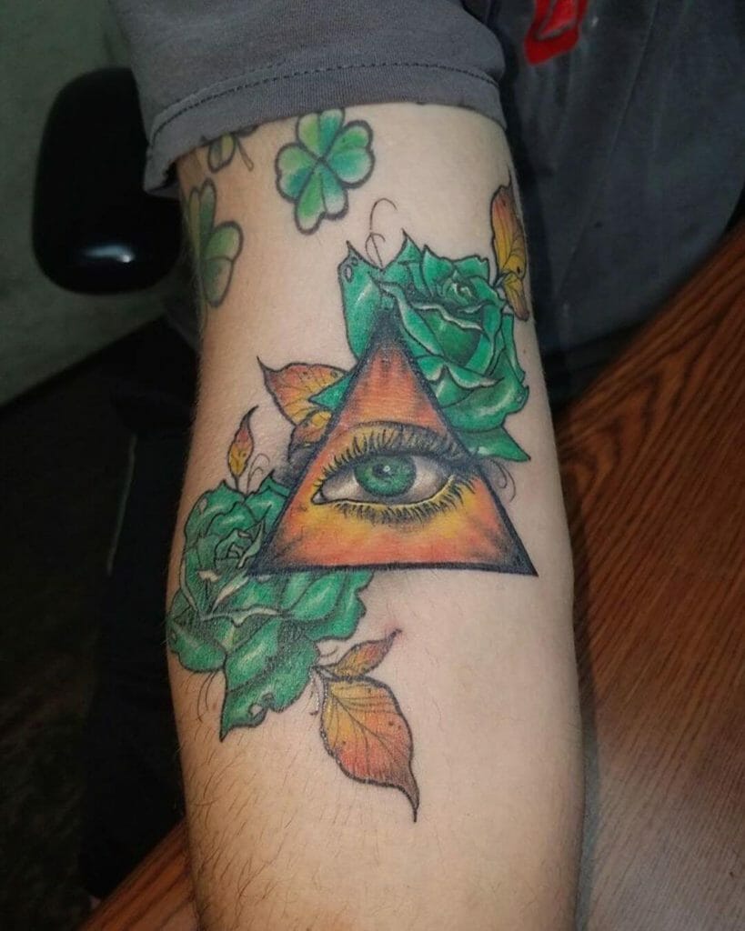 Green Rose Tattoo With Geometric Eye Design