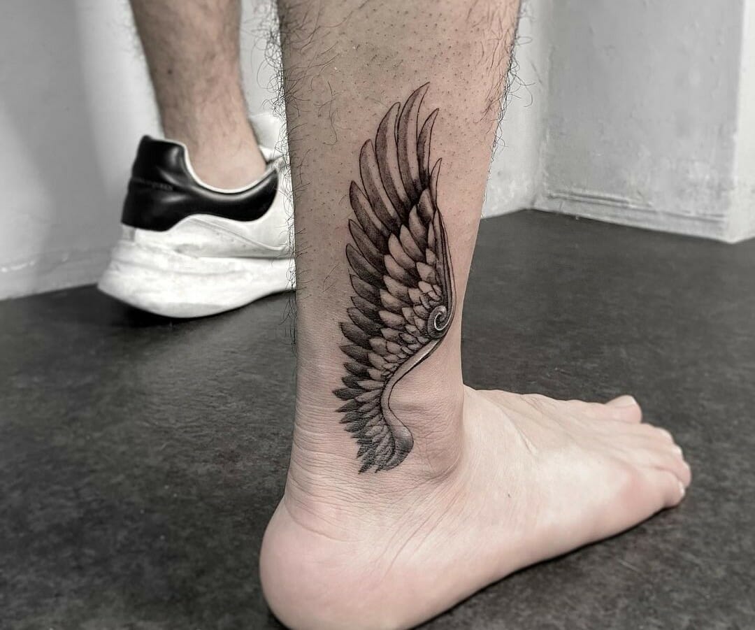 Elegant Wing Tattoo Designs - Discover the Perfect Inspiration