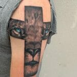 Lion And Cross Tattoos