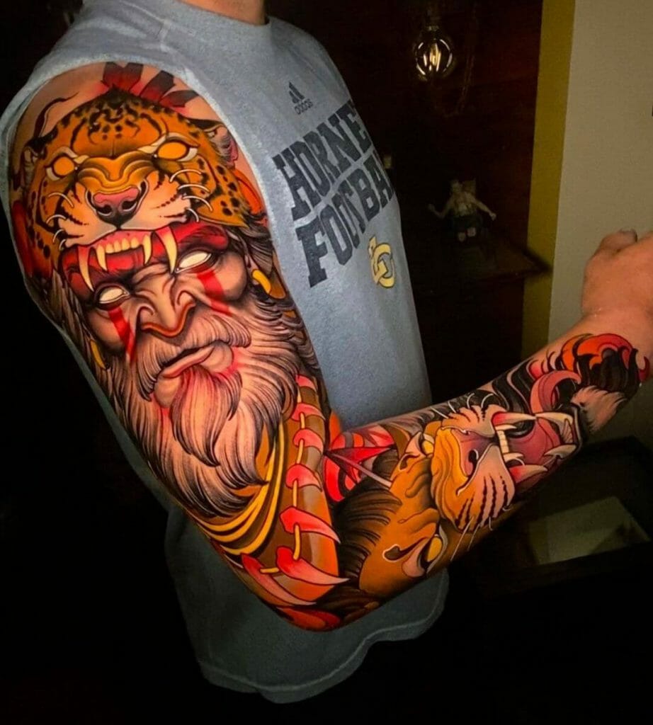 Lion Head Hunter Sleeve Tattoo