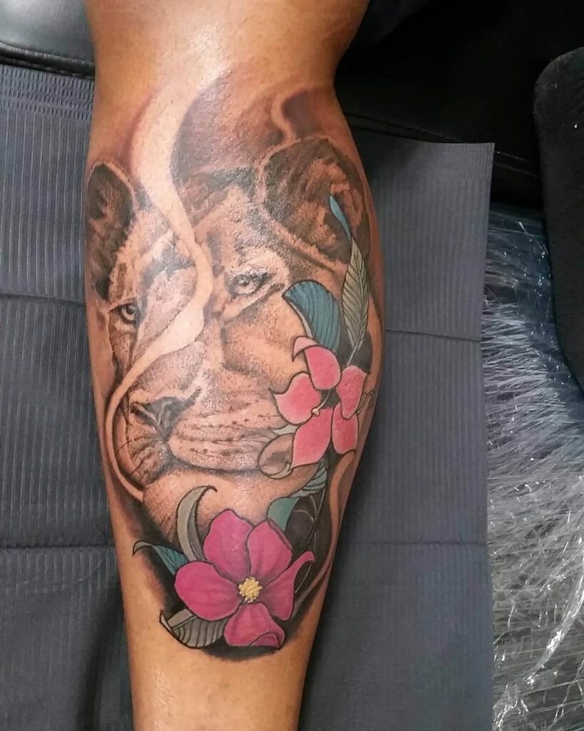 Lioness With Flowers Tattoo