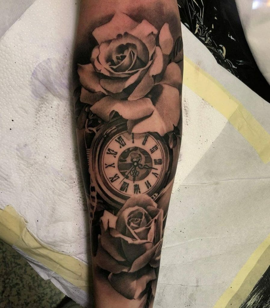 Lower Arm Rose And Clock Sleeve Tattoo