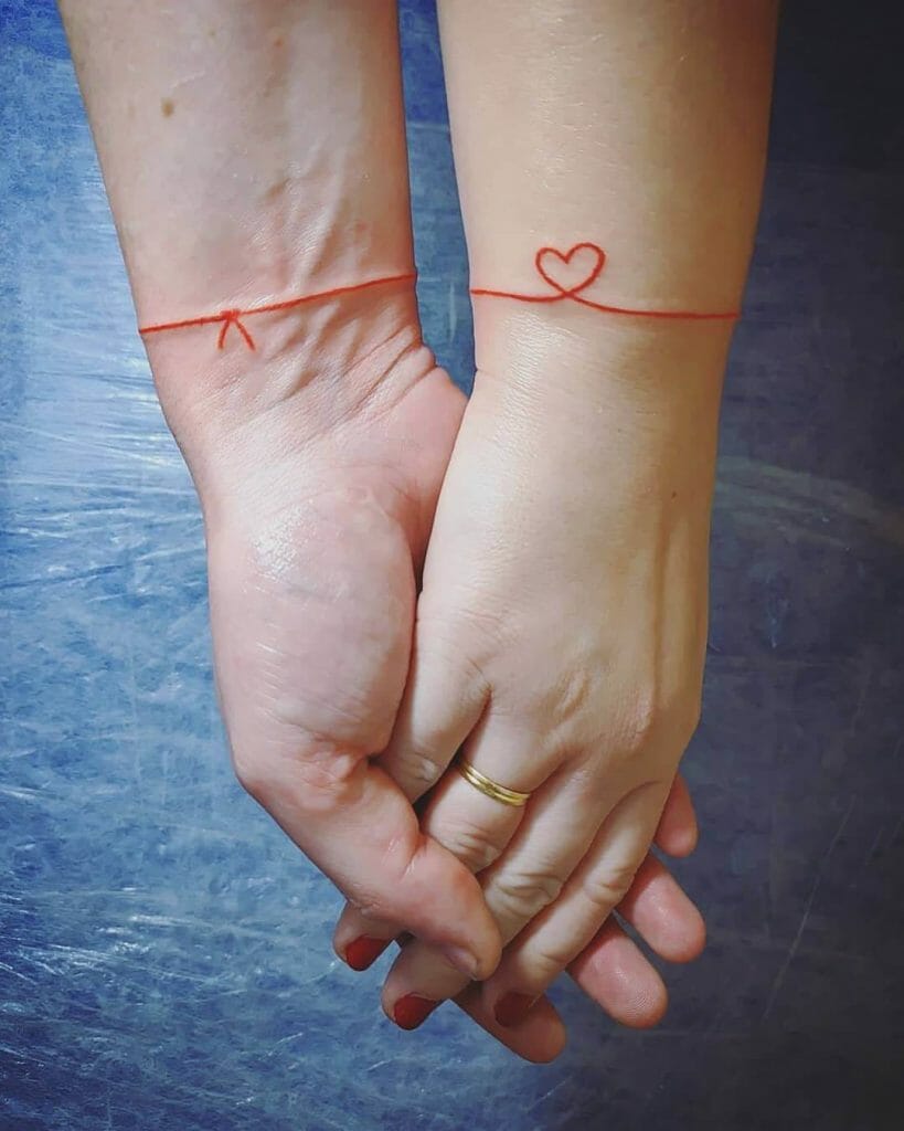 Minimal Red Thread Tattoo Ideas For Couples