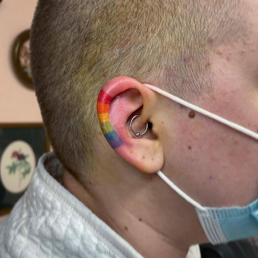 Minimalistic Rainbow Pride Tattoo On Ear