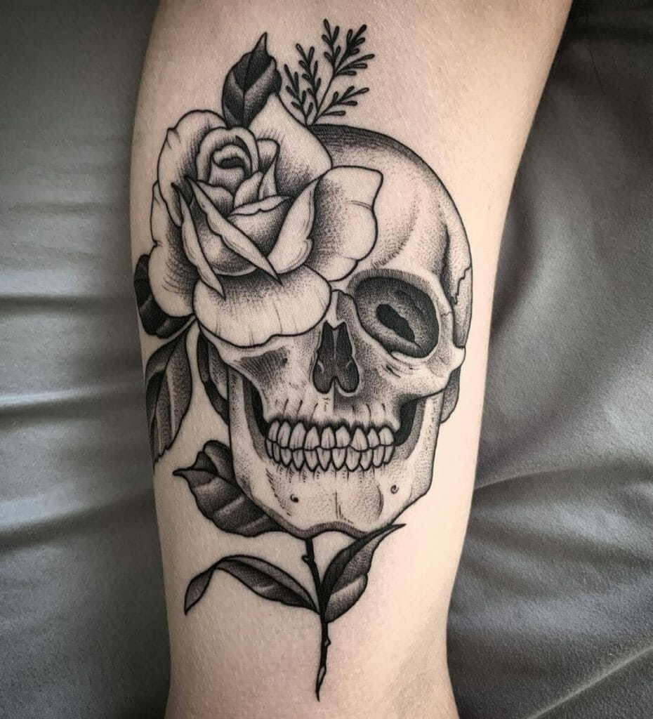 Mixture Of Life And Death: A Skeleton Tattoo With Flowers In It