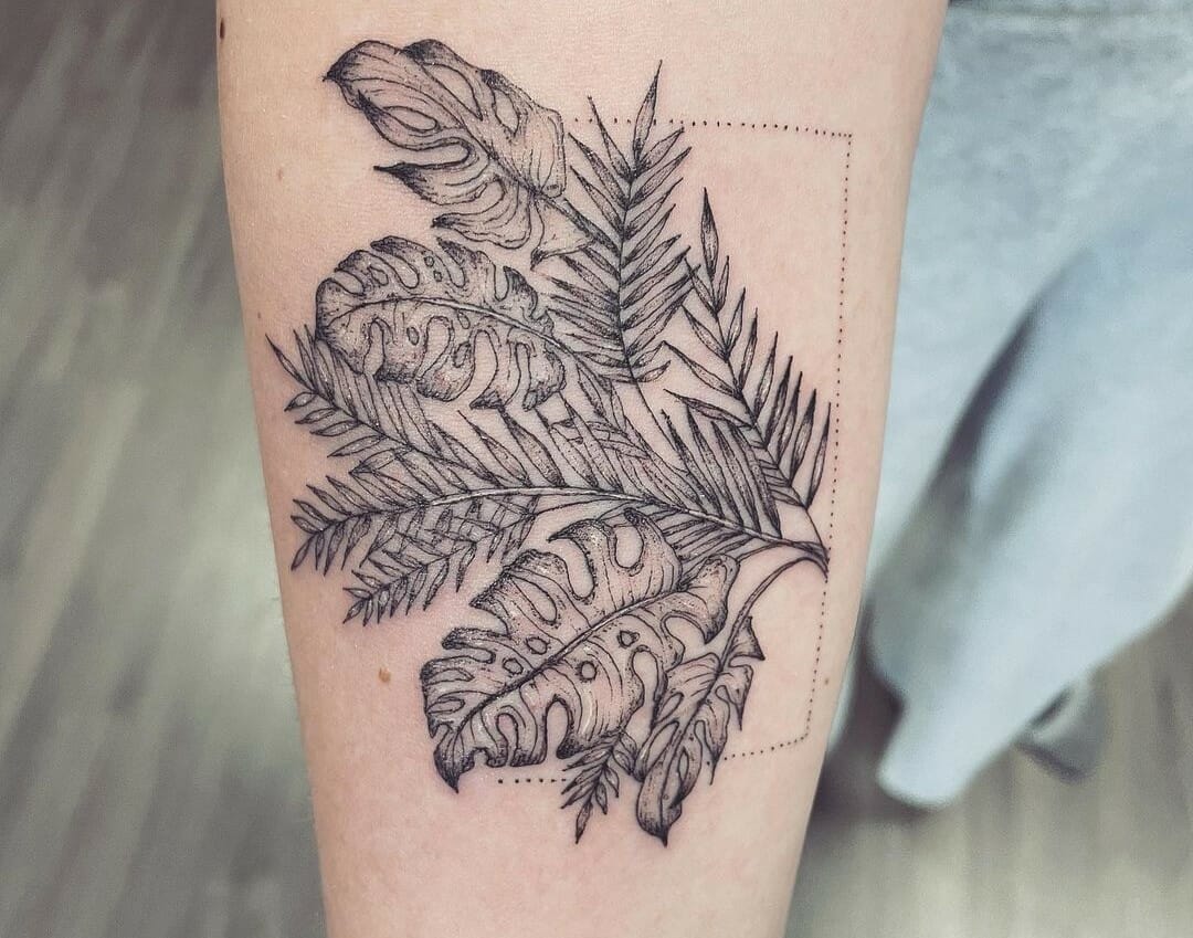 Fine line monstera leaf tattoo on the inner forearm