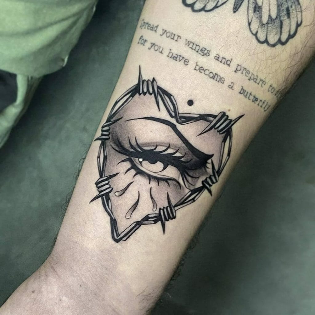 Neotraditional Eye Tattoo With A Barbed-Wire Heart