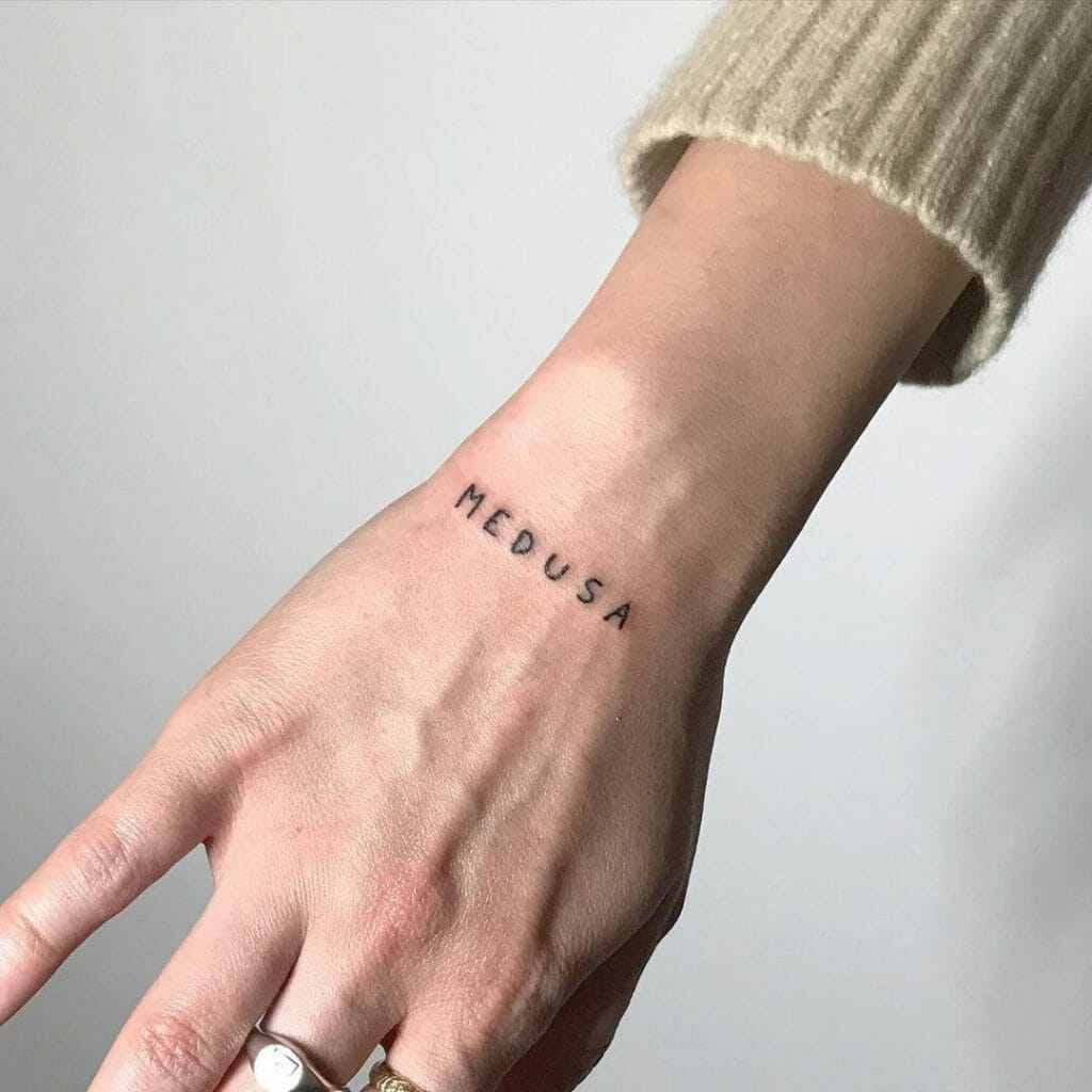 One Word Wrist Tattoo For Women 