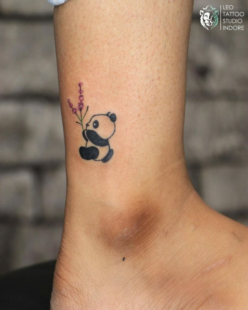 Panda Bear Holding A Flower Tattoo