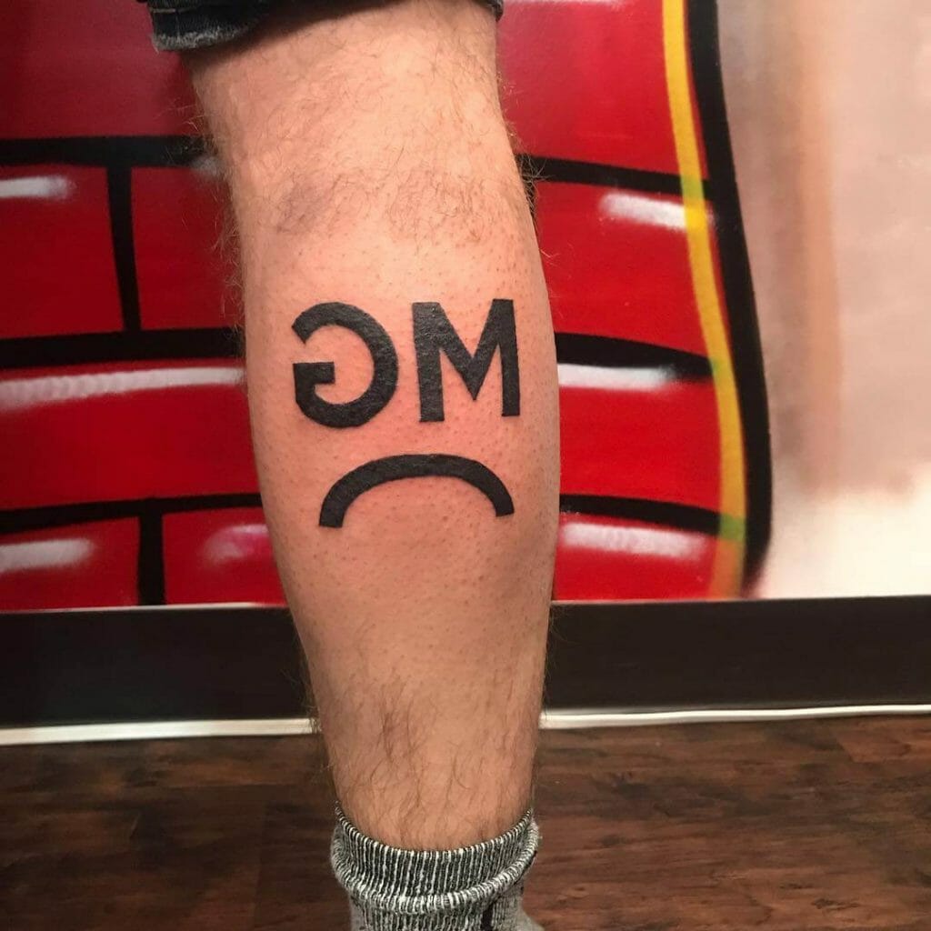 Rocking Reverse G and M Cattle Brand Tattoos