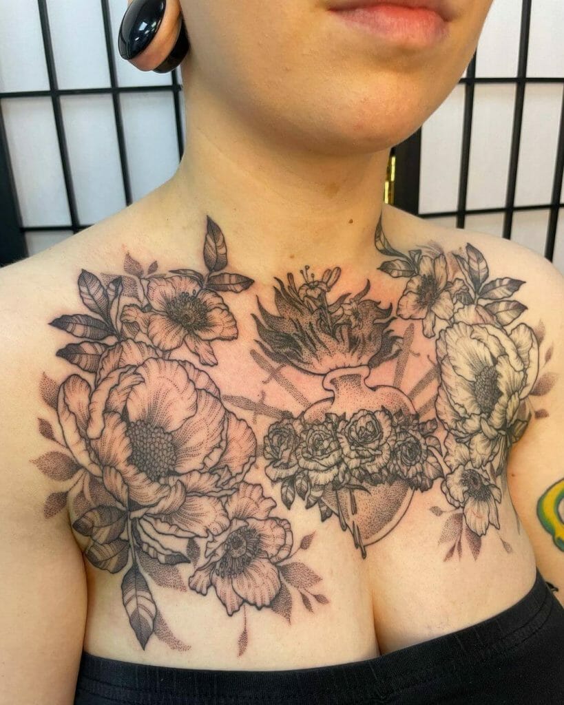 Sacred Heart Chest Tattoo With Beautiful Flowers