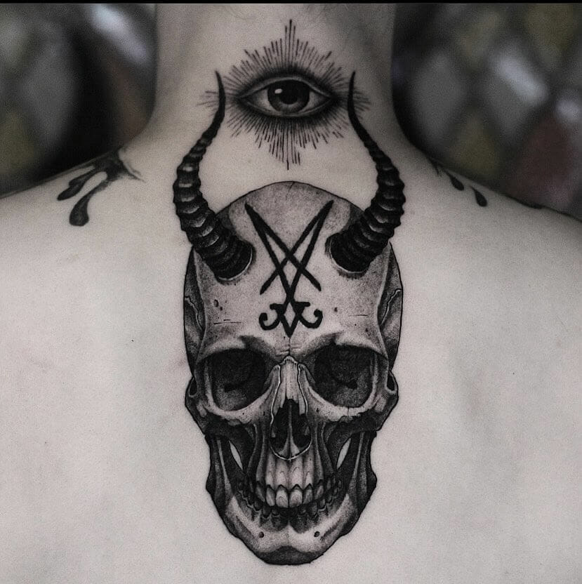 Skull And Evil Eye Tattoo