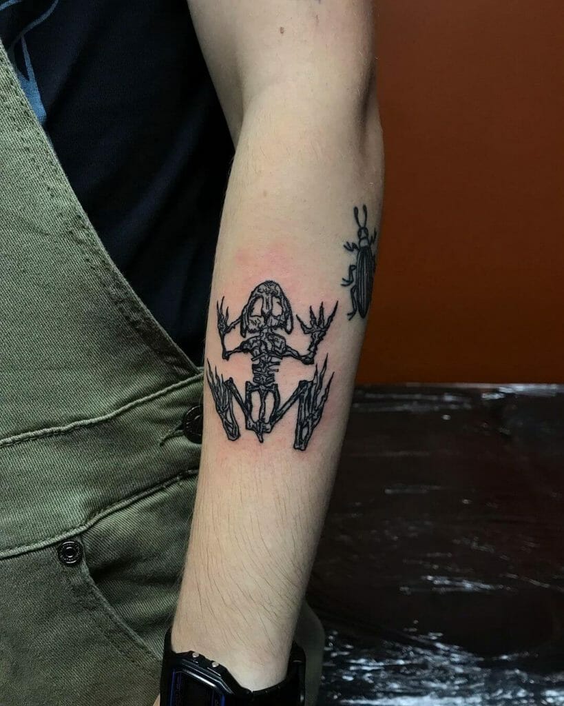 Small Bone Frog Tattoo On Arm
