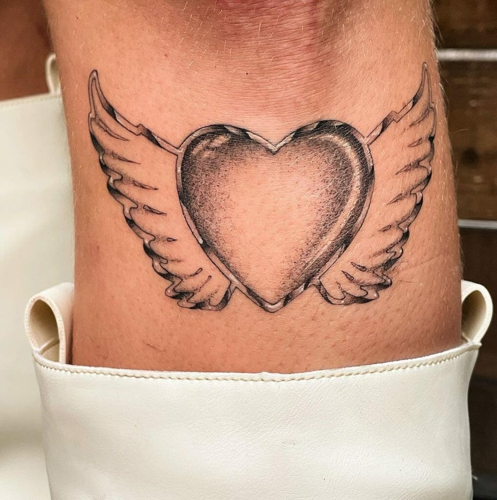 Small Heart With Angel Wings Tattoo