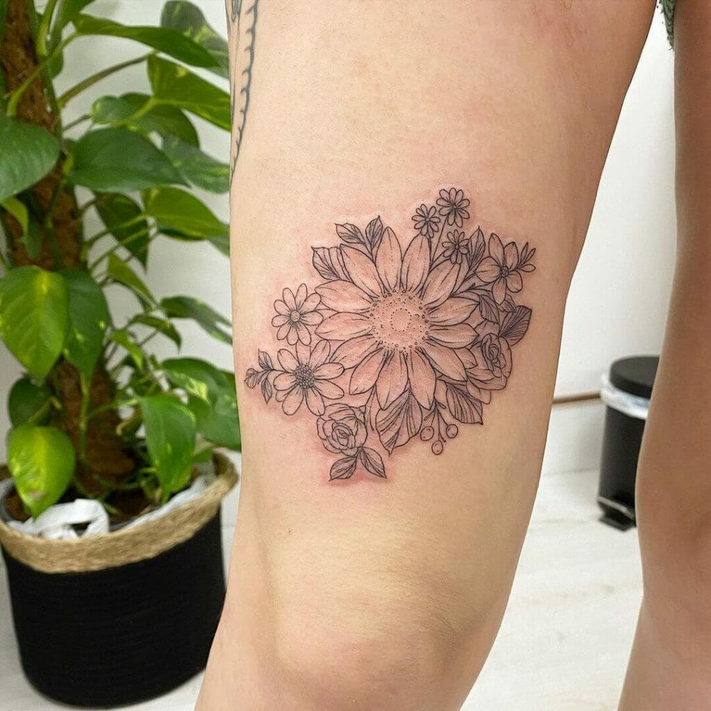 Sunflower Tattoo Above Your Knee To Brighten Your Day
