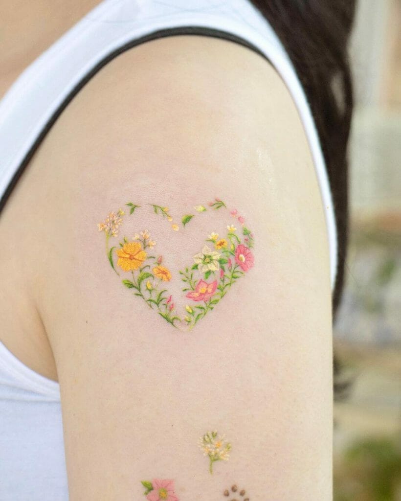 The Pretty A Heart Full Of Daisies Arm Tattoo