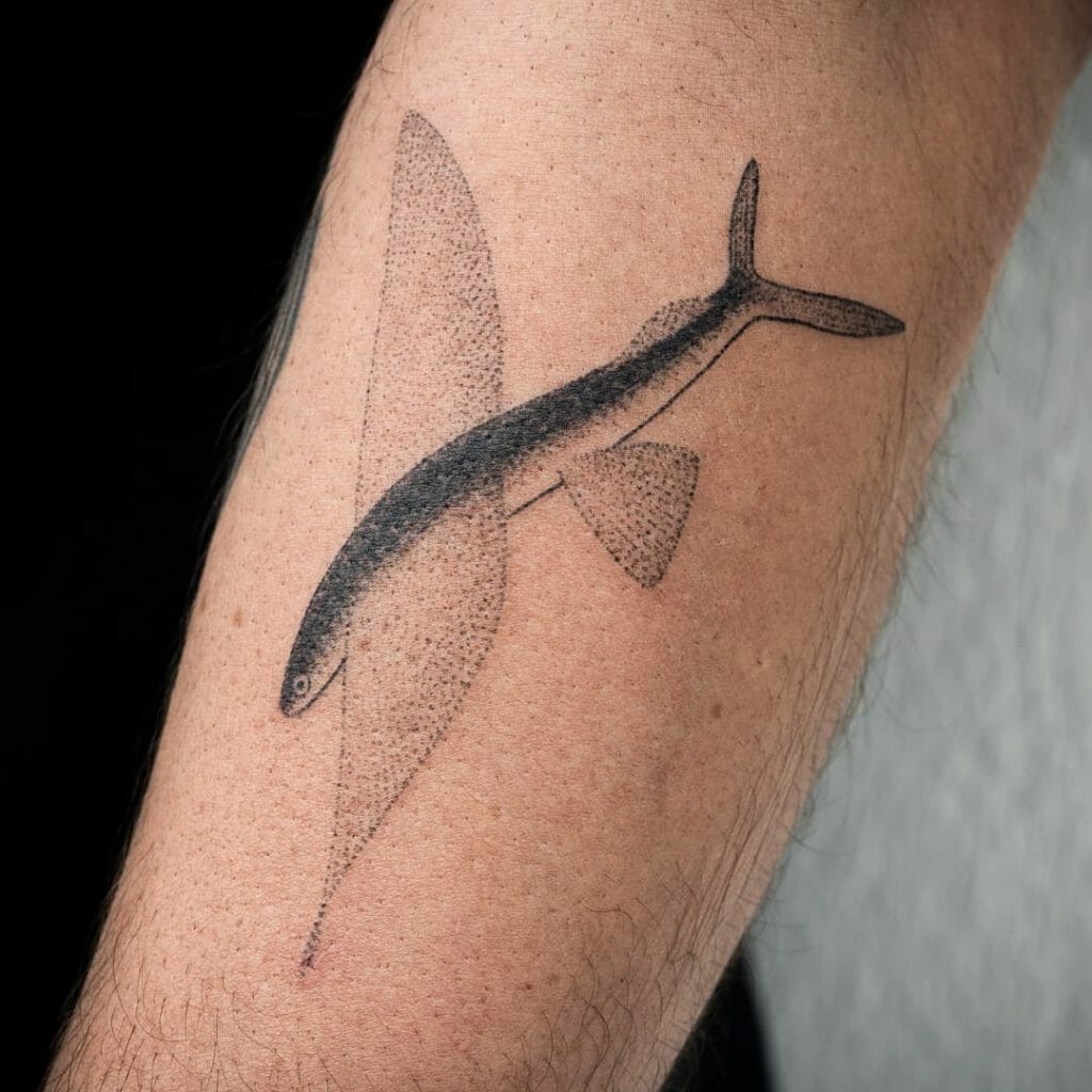 The Simple Hand-poked Flying Fish Tattoo