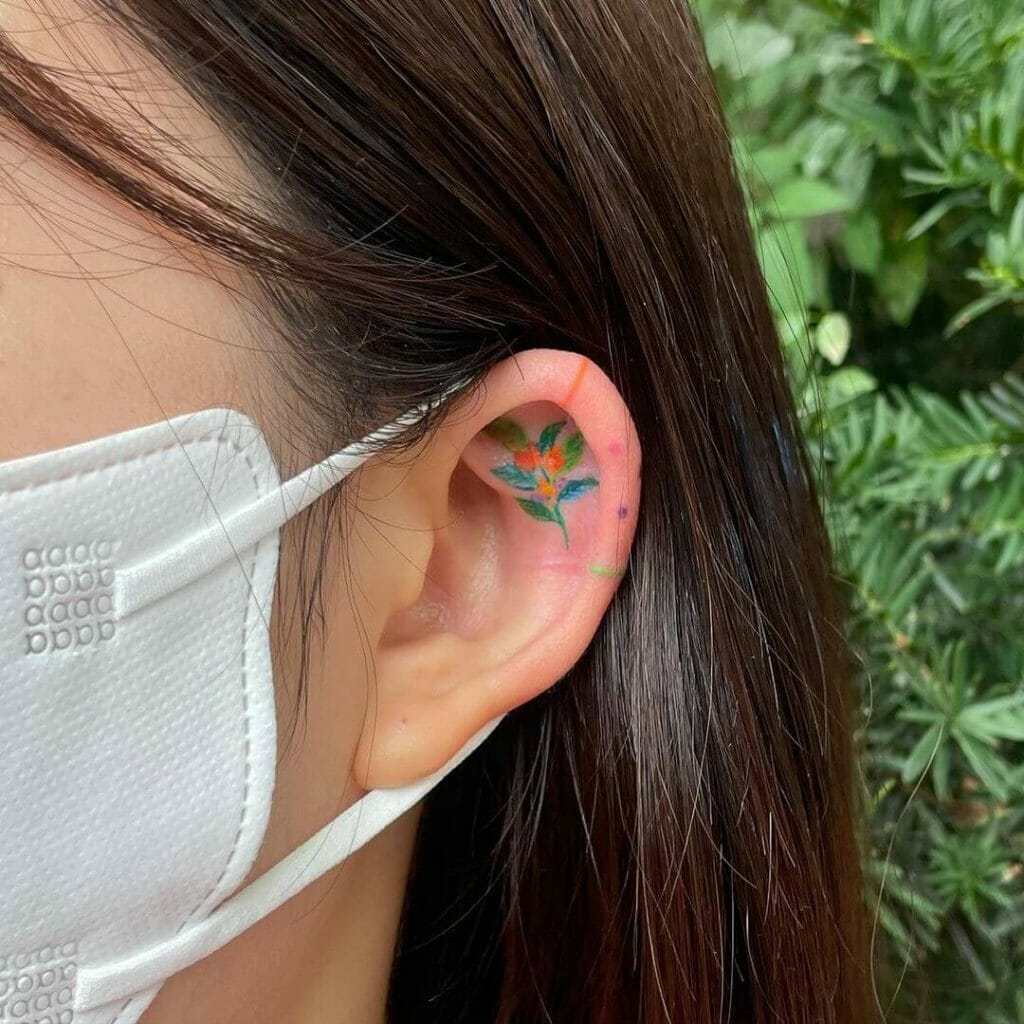 Tiny Colourful Flowered Ear Tattoos