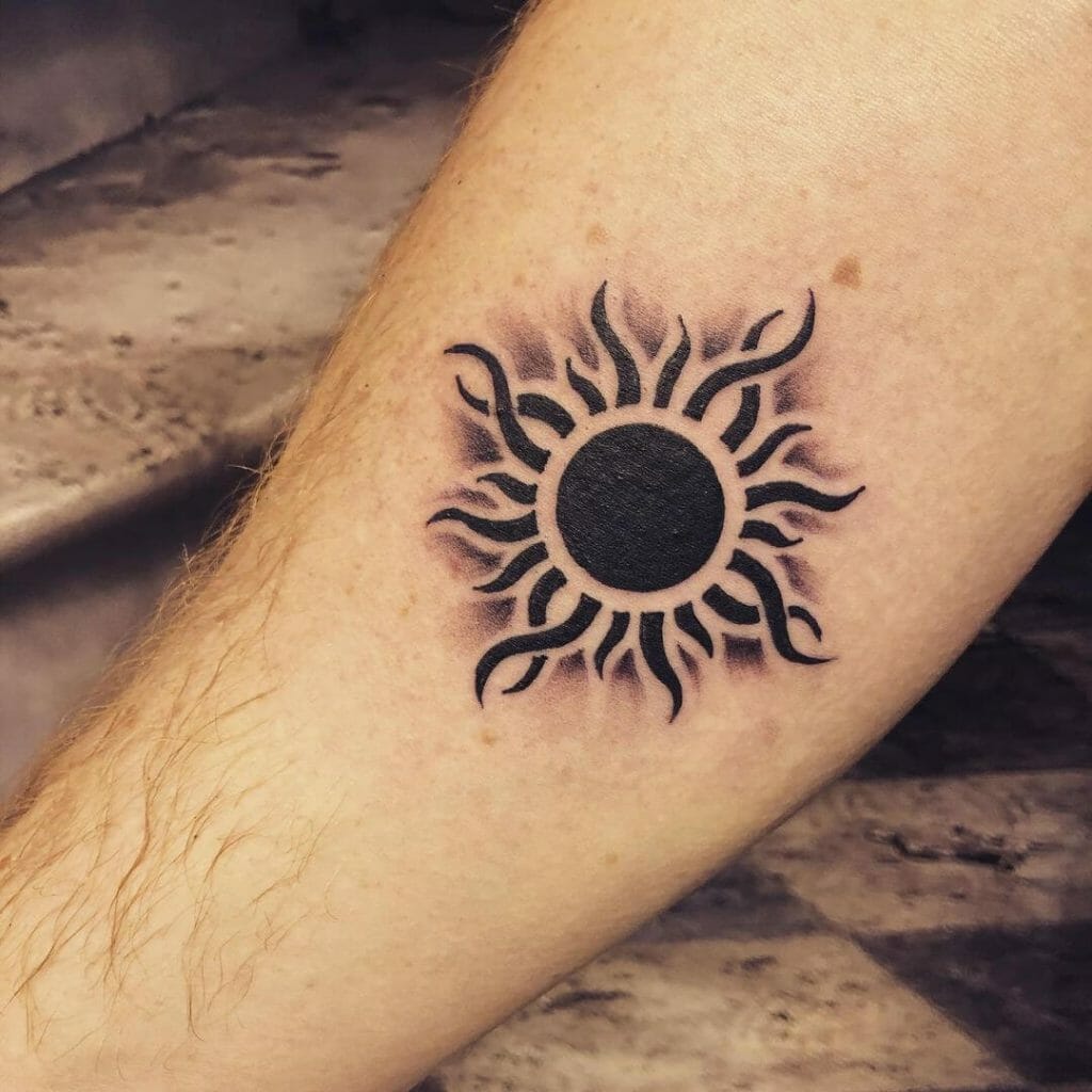Tribal Sun Tattoo Design In Black