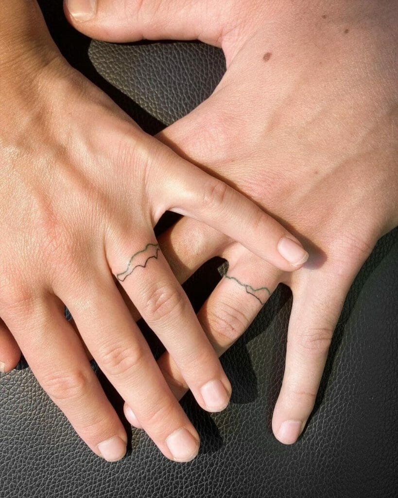 Wedding Ring Tattoos Of Mountains