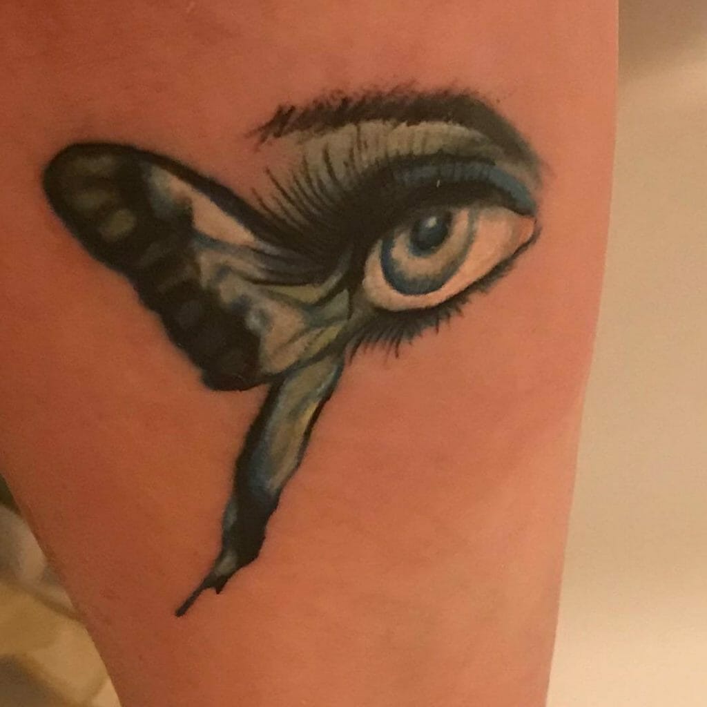 Winged Butterfly With Eye Tattoo