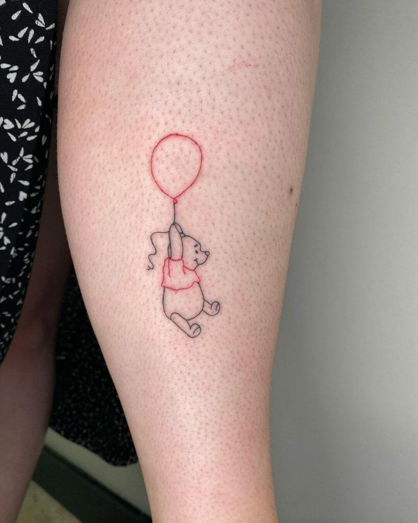 Winnie The Pooh Flying Using A Baloon Tattoo