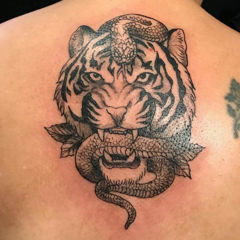 A Tiger And A Snake Tattoo