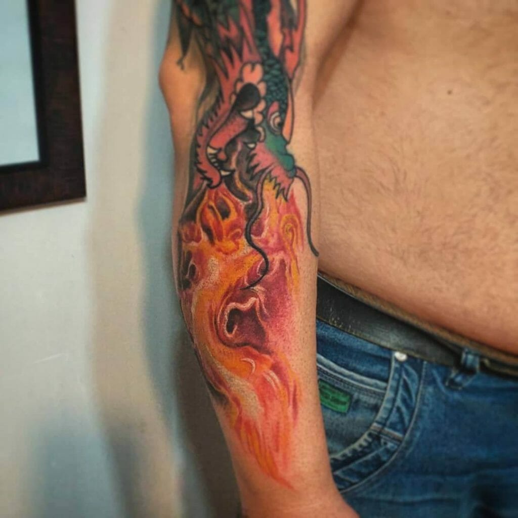 Dragon Breathing Fire Forearm Tattoo