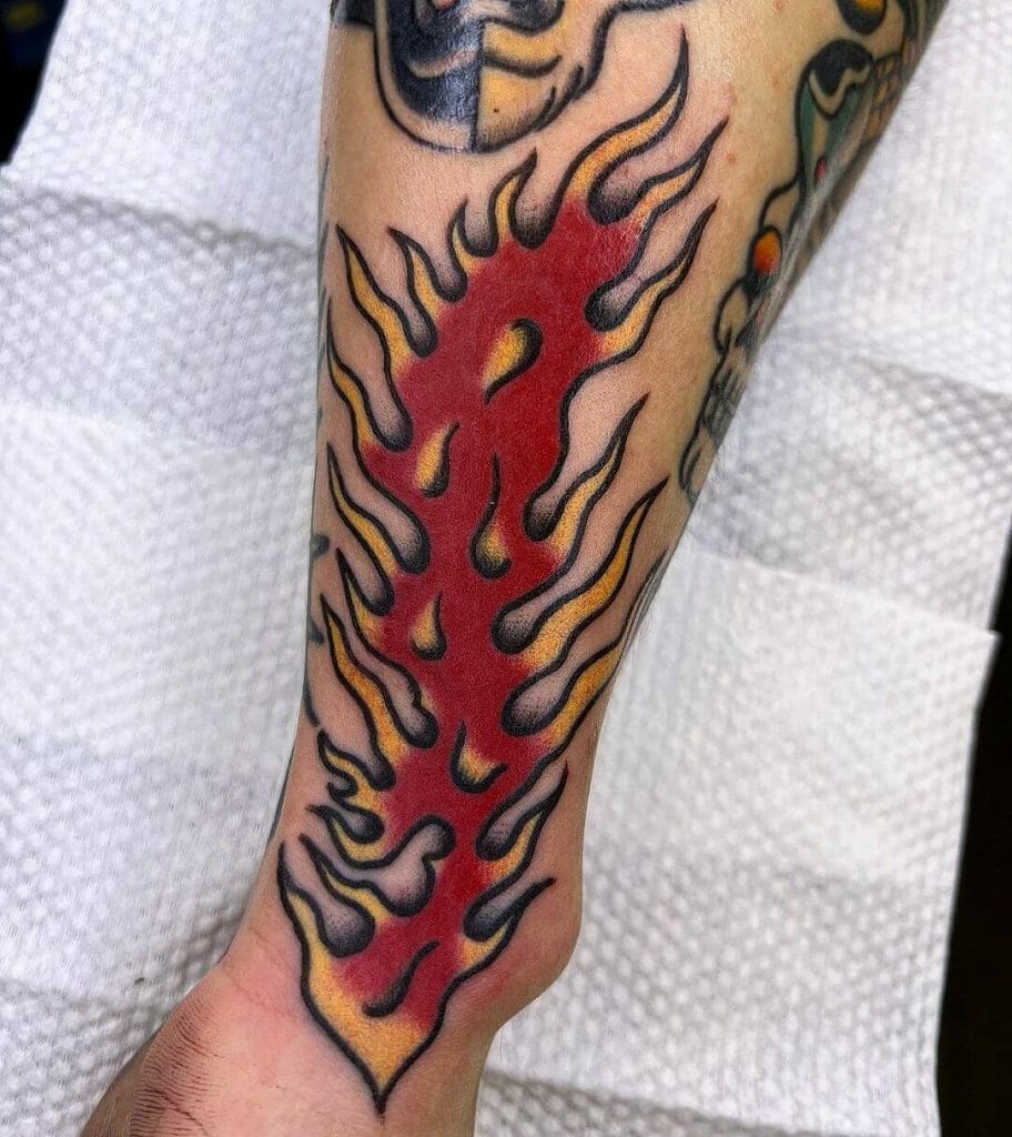 Red And Yellow Tribal Fire Tattoo