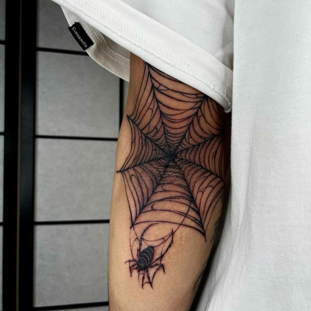 Spider Tattoos With Web On Upper Arm