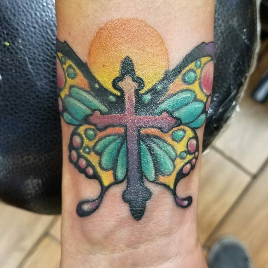The Butterfly Cross Tattoo With a Halo