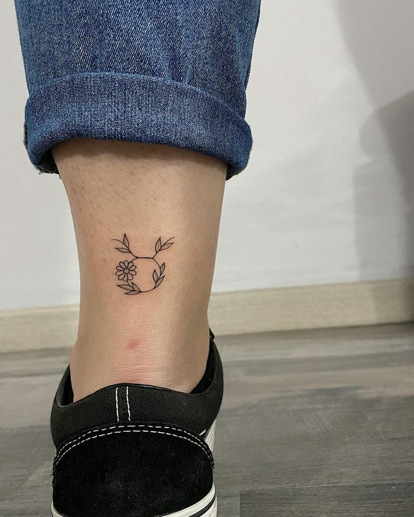 A Minimal Floral Taurus Symbol Tattoo