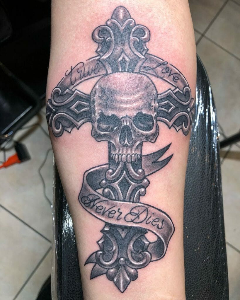 A Skull Tattoo With Banner And Cross
