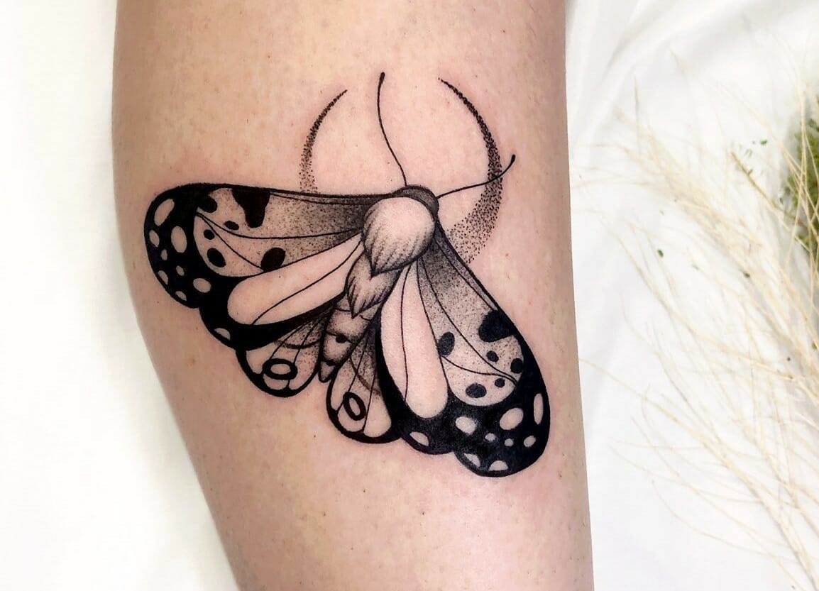 black and grey moth tattoo